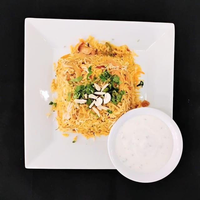 Goat (Bone-In) Biryani.