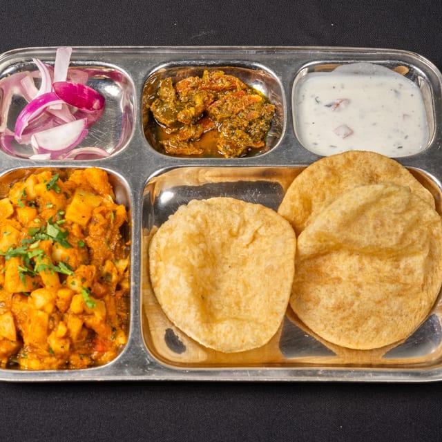 Chole Bature / Aloo Puri.